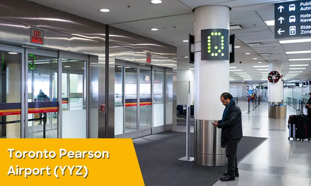 The Terminal 1 ground transportation level at Toronto Pearson, where Landline boards near Door Q.